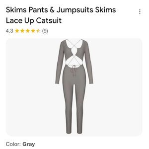 skims lace up cat suit NWT xxs